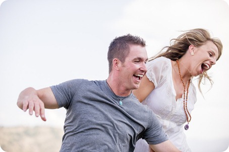 Okanagan-Lake-engagement-session_fun-couple-field-dog-wine14_by-Kevin-Trowbridge