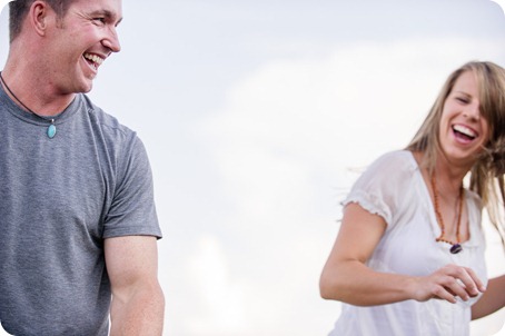 Okanagan-Lake-engagement-session_fun-couple-field-dog-wine15_by-Kevin-Trowbridge