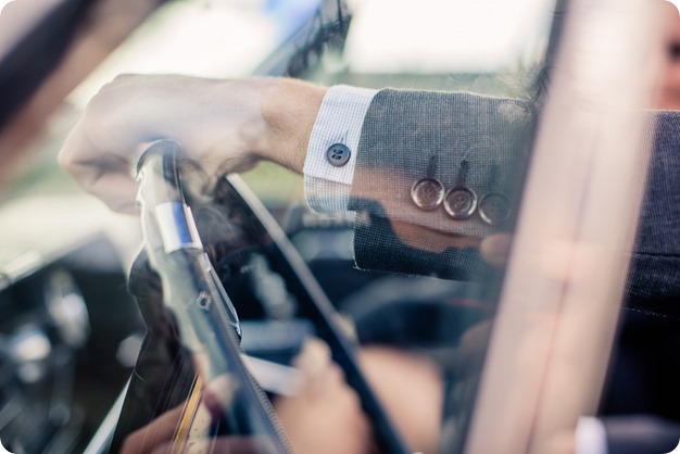 convertible-Cadillac_engagement-portraits_travel-cherry-orchard_Okanagan_04_by-Kevin-Trowbridge