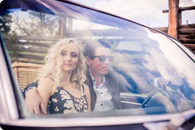 convertible-Cadillac_engagement-portraits_travel-cherry-orchard_Okanagan_07_by-Kevin-Trowbridge