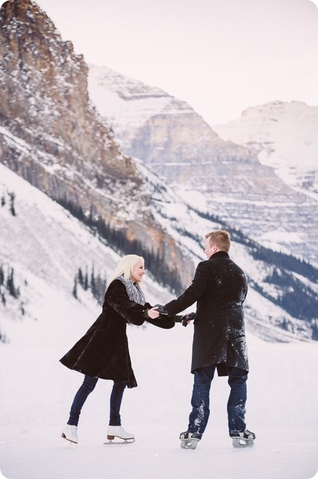 Lake-Louise-wedding-photographer_Fairmont-engagement-portraits_skating-ice-sculpture-festival___by-Kevin-Trowbridge-199