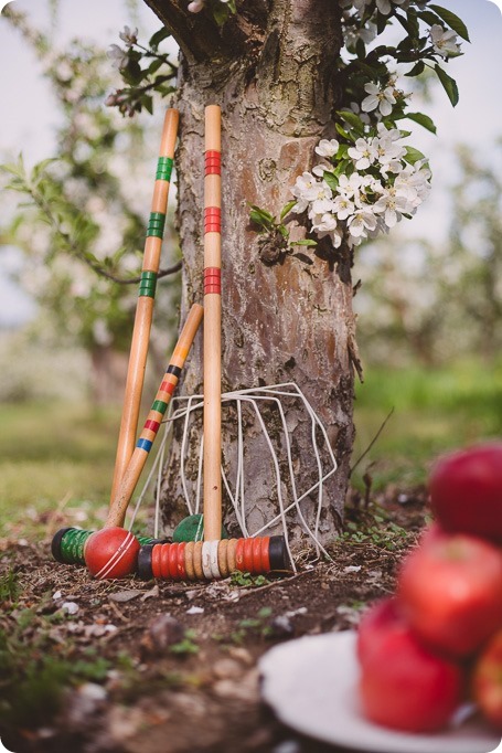 Kelowna-engagement-session_orchard-blossom_croquet-portraits_vintage-floral-dress_02_by-Kevin-Trowbridge