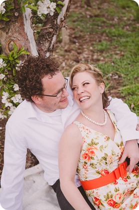 Kelowna-engagement-session_orchard-blossom_croquet-portraits_vintage-floral-dress_38_by-Kevin-Trowbridge