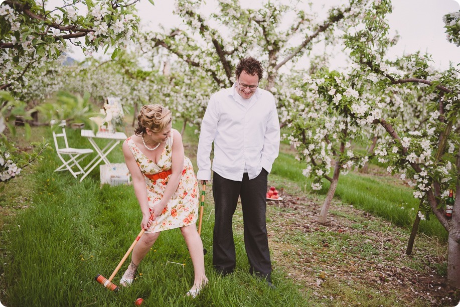 Kelowna-engagement-session_orchard-blossom_croquet-portraits_vintage-floral-dress_53_by-Kevin-Trowbridge