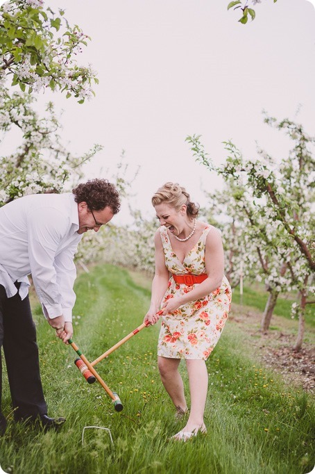 Kelowna-engagement-session_orchard-blossom_croquet-portraits_vintage-floral-dress_54_by-Kevin-Trowbridge