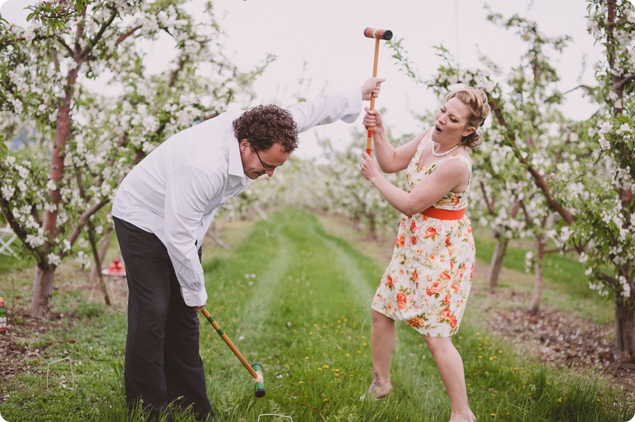 Kelowna-engagement-session_orchard-blossom_croquet-portraits_vintage-floral-dress_55_by-Kevin-Trowbridge