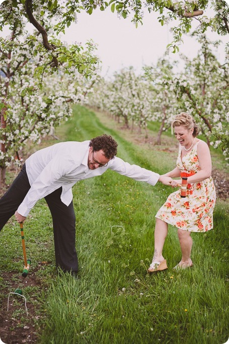 Kelowna-engagement-session_orchard-blossom_croquet-portraits_vintage-floral-dress_56_by-Kevin-Trowbridge