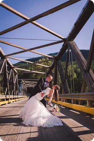 Enderby-wedding_orchard-bridge-sparklers_Okanagan_181802_by-Kevin-Trowbridge