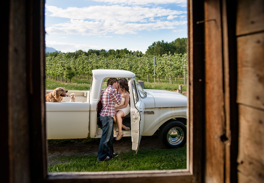 Countryside Orchard Romance: Vintage Truck Engagement Session in Kelowna, BC